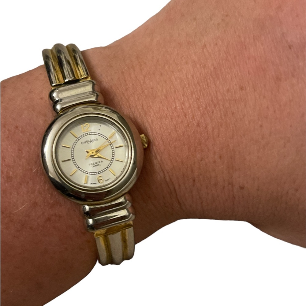 Vintage Explraess Gold and Silver Toned Women’s Circle Faced Cuff Watch